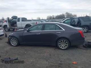 2014 Cadillac CTS Luxury RWD with VIN 1G6AR5S3XE0192441, listed as a IAAI auction lot 41707095 with 205,904 mi miles and . Bid and sale history available at DreamBid. Image 14.