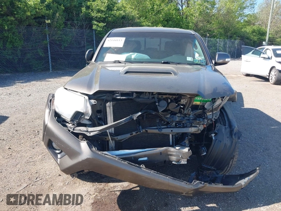 2015 Toyota Tacoma with VIN 3TMMU4FN5FM082376, listed as a IAAI auction lot 42144113 with 98,244 mi miles and . Bid and sale history available at DreamBid. Image 13.