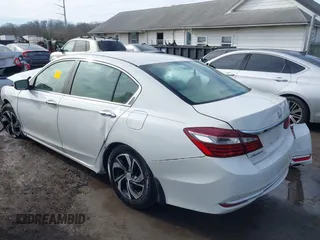 2017 Honda Accord Sedan LX with VIN 1HGCR2F34HA114252, listed as a IAAI auction lot 41456643 with 163,267 mi miles. Bid and sale history available at carsss.com. Image 3.