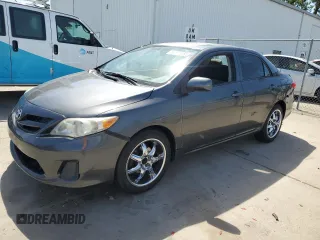 2013 Toyota Corolla L with VIN 2T1BU4EE4DC014150, listed as a Copart auction lot 56975465 with 184,354 mi miles and Clean Title. Bid and sale history available at DreamBid. Image 1.