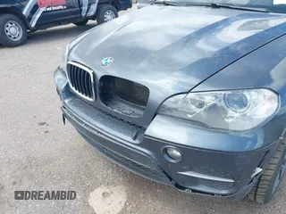 2012 BMW X5 35i z VIN 5UXZV4C53CL987556, wystawiony jako IAAI lot #42297756 z przebiegiem 190 922 mil mil oraz . Historia ofert i sprzedaży dostępna na DreamBid. Obrazek 6.