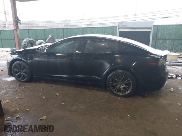 2022 Tesla Model S Plaid with VIN 5YJSA1E64NF477855, listed as a IAAI auction lot 41470591 with Not provided miles and . Bid and sale history available at DreamBid. Image 14.