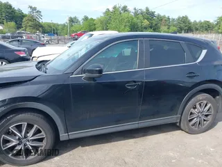 2018 Mazda CX-5 Touring z VIN JM3KFBCM9J0358997, wystawiony jako IAAI lot #42332606 z przebiegiem 93 952 mil mil oraz . Historia ofert i sprzedaży dostępna na DreamBid. Obrazek 14.
