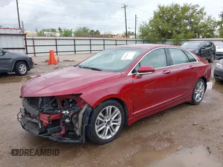 2014 Lincoln MKZ Hybrid z VIN 3LN6L2LU7ER811633, wystawiony jako IAAI lot #41870485 z przebiegiem 203 692 mil mil oraz . Historia ofert i sprzedaży dostępna na DreamBid. Obrazek 2.