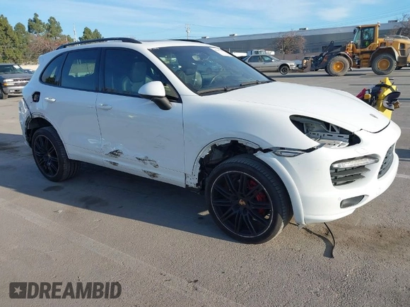2013 Porsche Cayenne GTS with VIN WP1AD2A22DLA71143, listed as a IAAI auction lot 41287138 with 143,434 mi miles and . Bid and sale history available at DreamBid. Image 1.