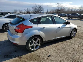 2014 Ford Focus Titanium z VIN 1FADP3N2XEL263357, wystawiony jako Copart lot #84610634 z przebiegiem 142 023 mil mil oraz Nie do naprawy • Non repairable. Historia ofert i sprzedaży dostępna na DreamBid. Obrazek 3.