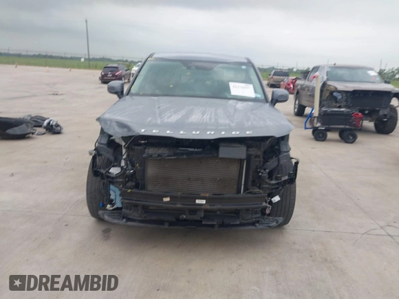 2022 Kia Telluride LX z VIN 5XYP2DHC5NG209265, wystawiony jako IAAI lot #42376957 z przebiegiem 51 615 mil mil oraz . Historia ofert i sprzedaży dostępna na DreamBid. Obrazek 13.