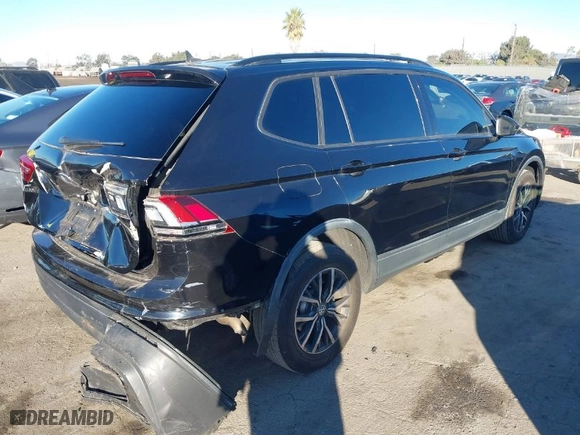 2021 Volkswagen Tiguan S with VIN 3VV1B7AX2MM051166, listed as a IAAI auction lot 41233878 with 28,690 mi miles. Bid and sale history available at carsss.com. Image 4.