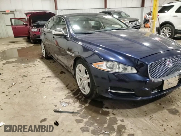 2014 Jaguar XJ Portfolio with VIN SAJWJ2GD7E8V67473, listed as a Copart auction lot 43968705 with 99,146 mi miles and Salvage title. Bid and sale history available at DreamBid. Image 13.