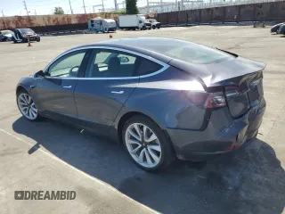 2020 Tesla Model 3 Long Range with VIN 5YJ3E1EB4LF650955, listed as a Copart auction lot 51931255 with 59,046 mi miles and Salvage Title. Bid and sale history available at carsss.com. Image 2.