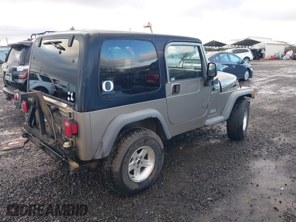 2004 Jeep Wrangler Sport with VIN 1J4FA49S94P711531, listed as a IAAI auction lot 41306863 with 143,720 mi miles and . Bid and sale history available at DreamBid. Image 4.