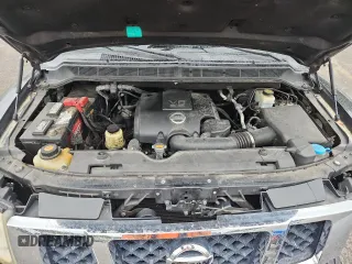 2010 Nissan Armada Titanium z VIN 5N1BA0ND0AN619506, wystawiony jako Copart lot #58329005 z przebiegiem 212 496 mil mil oraz Szkoda całkowita • Salvage title. Historia ofert i sprzedaży dostępna na DreamBid. Obrazek 12.