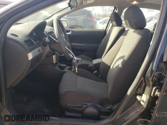 2010 Chevrolet Cobalt with VIN 1G1AC5F53A7161858, listed as a Copart auction lot 79773774 with 33,162 mi miles and Salvage Title. Bid and sale history available at DreamBid. Image 7.
