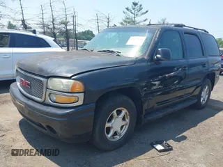 2003 GMC Yukon Denali z VIN 1GKEK63UX3J234604, wystawiony jako IAAI lot #42479968 z przebiegiem 319 855 mil mil oraz . Historia ofert i sprzedaży dostępna na DreamBid. Obrazek 2.