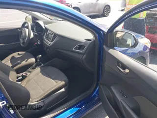 2019 Hyundai Accent SE with VIN 3KPC24A3XKE058361, listed as a IAAI auction lot 42345609 with 95,580 mi miles and . Bid and sale history available at DreamBid. Image 5.