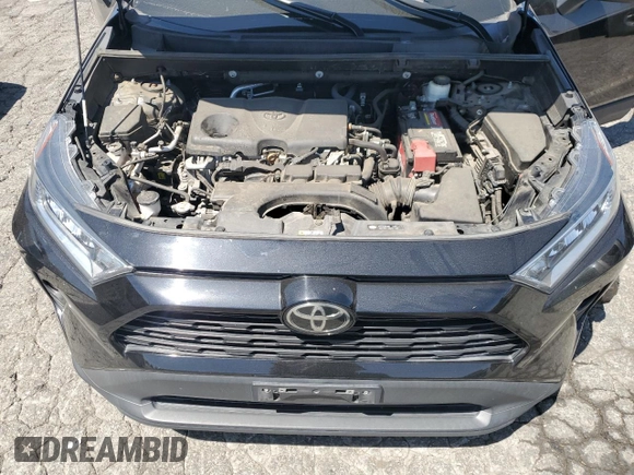2021 Toyota RAV4 XLE with VIN 2T3P1RFV8MC167485, listed as a Copart auction lot 57814355 with 73,188 mi miles and Salvage title. Bid and sale history available at DreamBid. Image 12.