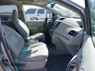 2011 Toyota Sienna XLE AAS with VIN 5TDYK3DCXBS172586, listed as a IAAI auction lot 41835992 with 203,599 mi miles. Bid and sale history available at carsss.com. Image 5.
