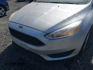 2017 Ford Focus SE with VIN 1FADP3F2XHL304413, listed as a IAAI auction lot 41939334 with 106,074 mi miles and . Bid and sale history available at DreamBid. Image 6.