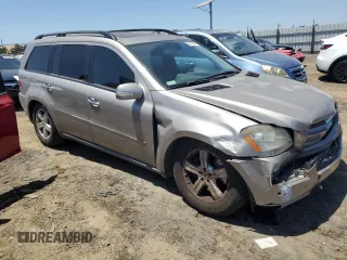 2007 Mercedes-Benz GL-Class with VIN 4JGBF71E97A195803, listed as a Copart auction lot 63149844 with 129,708 mi miles and Salvage Title. Bid and sale history available at carsss.com. Image 4.