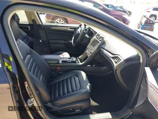 2019 Ford Fusion SEL with VIN 3FA6P0CD2KR113476, listed as a IAAI auction lot 41868614 with 86,650 mi miles. Bid and sale history available at carsss.com. Image 5.
