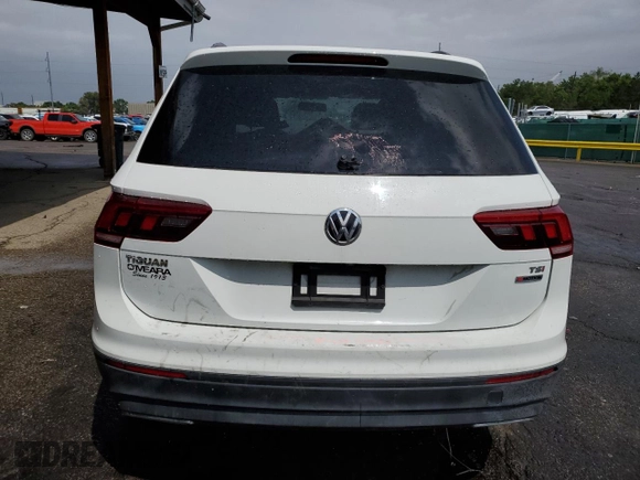 2018 Volkswagen Tiguan S with VIN 3VV0B7AX6JM094609, listed as a Copart auction lot 59550215 with 118,975 mi miles and Salvage title. Bid and sale history available at DreamBid. Image 6.