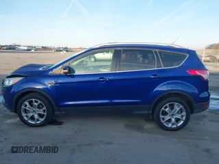 2014 Ford Escape Titanium with VIN 1FMCU9JX4EUD30964, listed as a IAAI auction lot 41772153 with 179,481 mi miles and . Bid and sale history available at DreamBid. Image 14.
