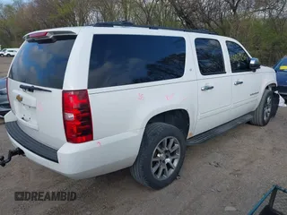 2013 Chevrolet Suburban LT with VIN 1GNSKJE79DR328718, listed as a IAAI auction lot 42005926 with 168,610 mi miles and . Bid and sale history available at DreamBid. Image 4.