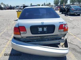 1997 Honda Civic LX z VIN 2HGEJ6670VH570062, wystawiony jako IAAI lot #42218254 z przebiegiem 86 555 mil mil oraz . Historia ofert i sprzedaży dostępna na DreamBid. Obrazek 16.