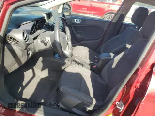 2014 Ford Fiesta SE z VIN 3FADP4BJ6EM130742, wystawiony jako Copart lot #54952305 z przebiegiem 63 353 mil mil oraz Szkoda całkowita • Salvage title. Historia ofert i sprzedaży dostępna na DreamBid. Obrazek 7.