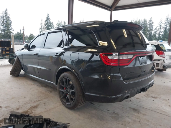 2023 Dodge Durango SRT 392 Premium with VIN 1C4SDJGJ6PC592871, listed as a IAAI auction lot 41740993 with 9,028 mi miles and . Bid and sale history available at DreamBid. Image 3.