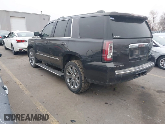 2015 GMC Yukon Denali with VIN 1GKS2CKJ2FR705806, listed as a IAAI auction lot 41568322 with 171,011 mi miles. Bid and sale history available at carsss.com. Image 3.