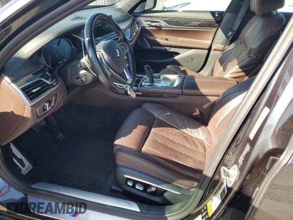 2016 BMW 7 Series 750i xDrive с VIN WBA7F2C56GG417976, выставлен на аукционе Copart как лот 55976095 с пробегом 113 753 миль миль и Списание • Salvage title. История ставок и продаж доступна на DreamBid. Изображение 7.