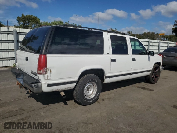 1999 Chevrolet Suburban with VIN 3GNEC16R5XG213001, listed as a Copart auction lot 43498865 with 236,306 mi miles and Salvage Title. Bid and sale history available at carsss.com. Image 3.