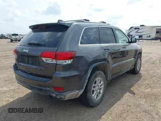 2020 Jeep Grand Cherokee Laredo E with VIN 1C4RJEAG2LC284912, listed as a IAAI auction lot 42114881 with 86,579 mi miles and . Bid and sale history available at DreamBid. Image 4.
