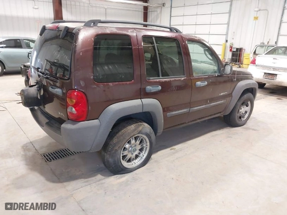 2004 Jeep Liberty Sport with VIN 1J4GL48K64W263786, listed as a IAAI auction lot 41825993 with 256,640 mi miles. Bid and sale history available at carsss.com. Image 4.