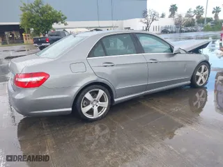 2011 Mercedes-Benz E-Class E 350 Luxury with VIN WDDHF5GB9BA403886, listed as a IAAI auction lot 41777041 with 193,322 mi miles. Bid and sale history available at carsss.com. Image 4.