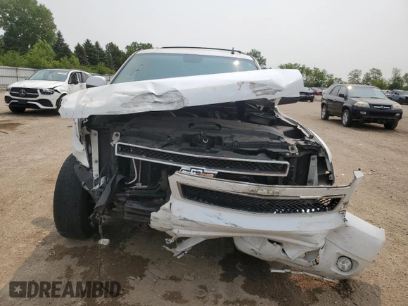 2011 Chevrolet Tahoe LT with VIN 1GNSKBE02BR200035, listed as a Copart auction lot 58730385 with 194,816 mi miles and Salvage title. Bid and sale history available at DreamBid. Image 5.