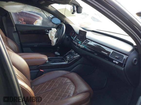 2015 Audi A8 4.0T z VIN WAU32AFD6FN022648, wystawiony jako IAAI lot #42358142 z przebiegiem 103 416 mil mil oraz . Historia ofert i sprzedaży dostępna na DreamBid. Obrazek 5.