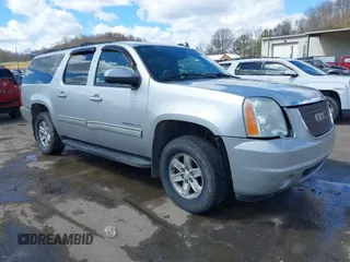 2011 GMC Yukon XL SLT z VIN 1GKS2KE38BR318226, wystawiony jako IAAI lot #41872809 z przebiegiem 149 929 mil mil oraz . Historia ofert i sprzedaży dostępna na DreamBid. Obrazek 1.