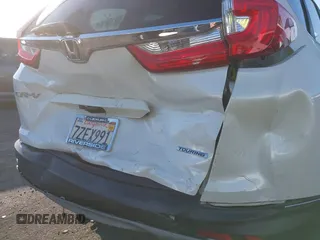 2017 Honda CR-V Touring with VIN 2HKRW1H96HH517669, listed as a IAAI auction lot 41653040 with 97,961 mi miles. Bid and sale history available at carsss.com. Image 18.