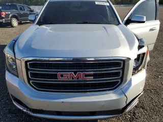 2015 GMC Yukon SLT z VIN 1GKS1BKC7FR527678, wystawiony jako Copart lot #53356615 z przebiegiem 110 125 mil mil oraz Szkoda całkowita • Salvage title. Historia ofert i sprzedaży dostępna na DreamBid. Obrazek 14.