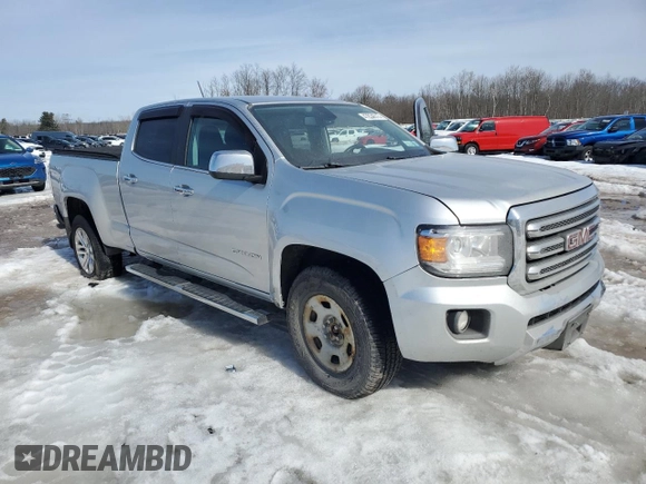 2015 GMC Canyon 4WD SLT with VIN 1GTG6CE31F1243580, listed as a Copart auction lot 47834315 with 87,767 mi miles and Salvage Title. Bid and sale history available at carsss.com. Image 4.