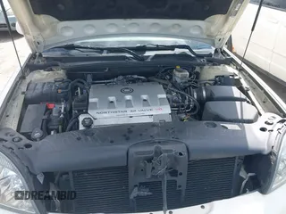 2003 Cadillac DeVille z VIN 1G6KD54Y23U221187, wystawiony jako IAAI lot #42339315 z przebiegiem 82 681 mil mil oraz . Historia ofert i sprzedaży dostępna na DreamBid. Obrazek 10.