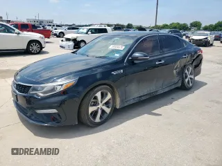 2019 Kia Optima LX с VIN 5XXGT4L30KG361619, выставлен на аукционе Copart как лот 59809575 с пробегом 118 626 миль миль и Чистый • Clean title. История ставок и продаж доступна на DreamBid. Изображение 1.