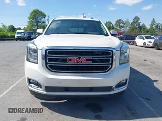 2015 GMC Yukon Denali with VIN 1GKS1CKJ3FR230797, listed as a IAAI auction lot 41977294 with 174,633 mi miles. Bid and sale history available at carsss.com. Image 12.
