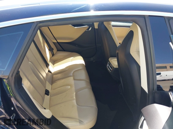 2014 Tesla Model S 60 with VIN 5YJSA1H12EFP46760, listed as a IAAI auction lot 42344596 with 106,252 mi miles and . Bid and sale history available at DreamBid. Image 8.