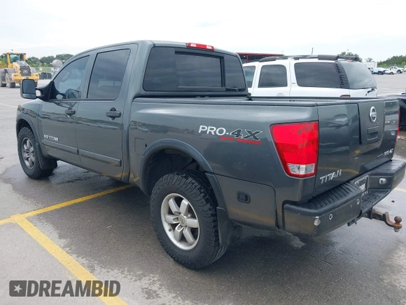 2010 Nissan Titan Pro-4X with VIN 1N6BA0EC9AN323943, listed as a IAAI auction lot 42795482 with 200,453 mi miles and . Bid and sale history available at DreamBid. Image 3.