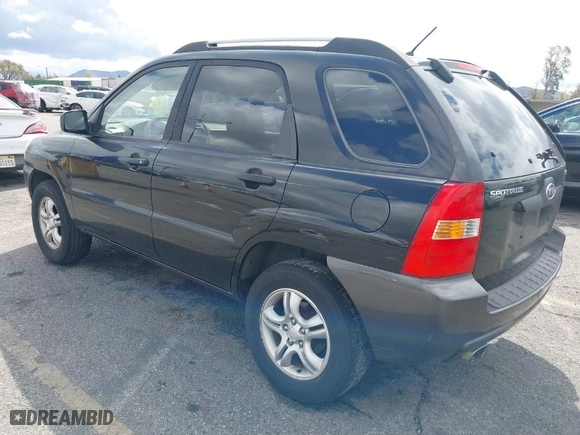 2006 Kia Sportage LX with VIN KNDJF723367279463, listed as a IAAI auction lot 41787584 with 171,271 mi miles. Bid and sale history available at carsss.com. Image 3.