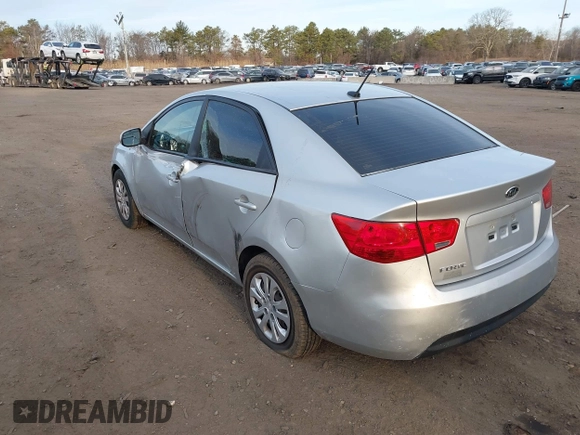 2011 Kia Forte LX with VIN KNAFT4A24B5403622, listed as a IAAI auction lot 41774093 with 143,971 mi miles. Bid and sale history available at carsss.com. Image 3.