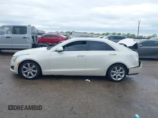 2014 Cadillac ATS Standard RWD with VIN 1G6AA5RX0E0185448, listed as a IAAI auction lot 41910150 with 179,969 mi miles and . Bid and sale history available at DreamBid. Image 14.